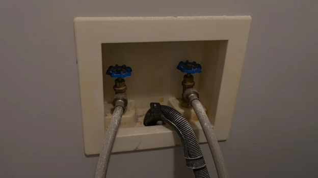 masquer un branchement de machine à laver